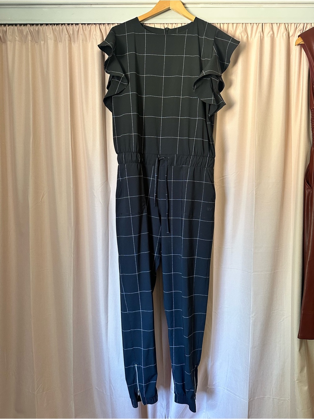 9-To-9 Windowpane Ruffle-Sleeve Jumpsuit in Black